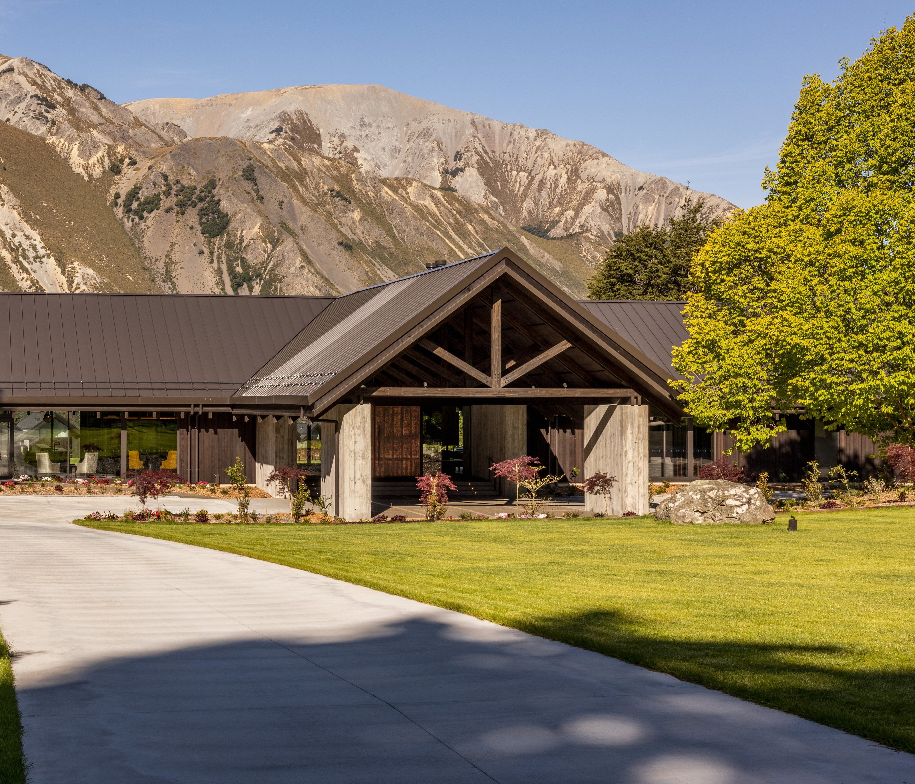 The homestead at Flockhill, a gabled timber and concrete entrance below bare Canterbury ranges